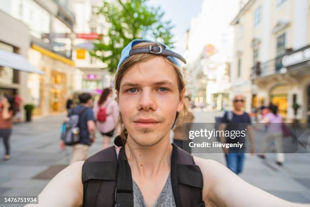 man takes selfie in vienna. austria. happy tourist - vienna museum stock pictures, royalty-free photos & images