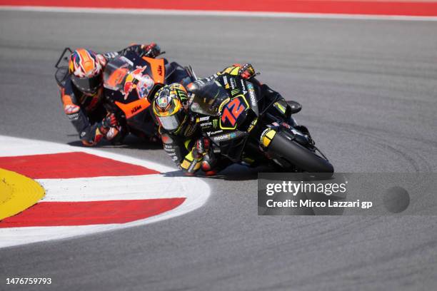 Marco Bezzecchi of Italy and Mooney VR46 Racing Team leads Jack Miller of Australia and Bull KTM Factory Racing during the MotoGP race during the...