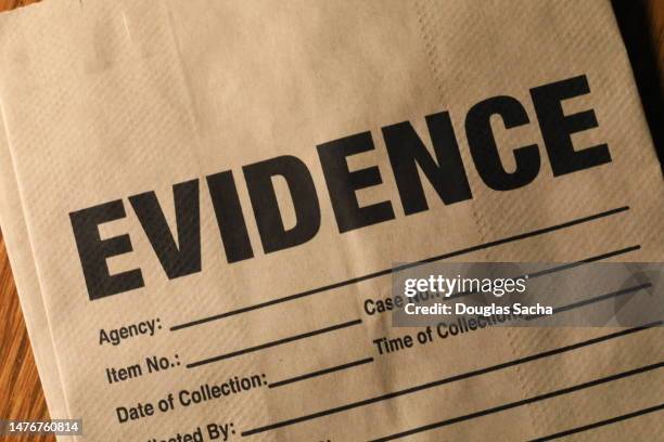 a paper bag of evidence - schaamhaar stockfoto's en -beelden