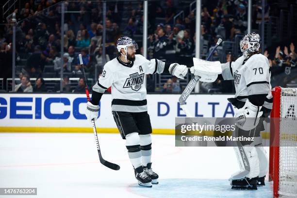 Drew Doughty and Joonas Korpisalo of the Los Angeles Kings in the third period at Crypto.com Arena on March 25, 2023 in Los Angeles, California.