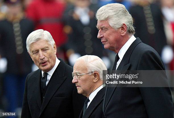 Three former Dutch prime ministers Dries van Agt, De Jong and Wim Kok, walk toward the Nieuwe Kerk church for the funeral ceremony of Prince Claus of...