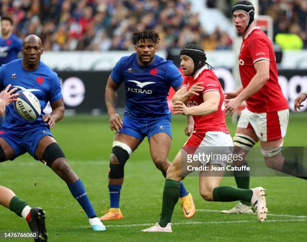 Leigh Halfpenny of Wales, Jonathan Danty of France during the Guinness Six Nations Rugby match between France and Wales at Stade de France on March...