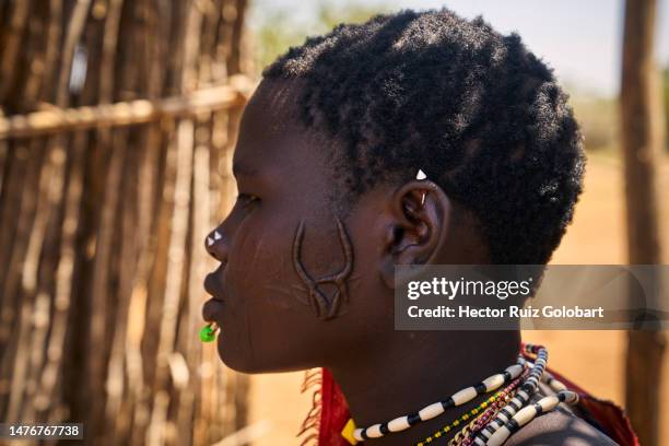 African Ritual Scarification 721 African Scarification Stock Photos, High-Res Pictures, and Images ...