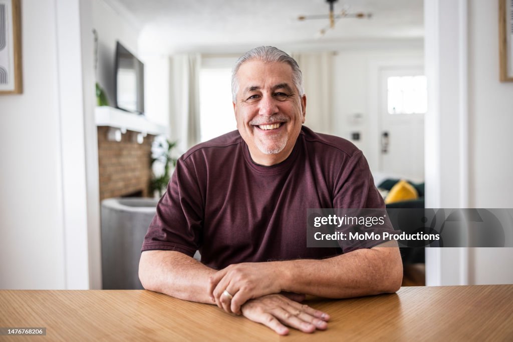 Portrait of senior couple in dining room