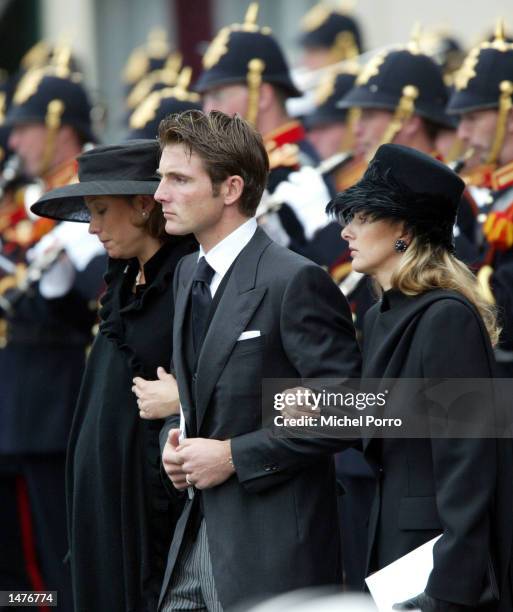 Princess Marilene, Prince Maurits and Mabel Wisse Smit, new girl friend of Prince Johan Friso, leave the Nieuwe Kerk church after the funeral for...