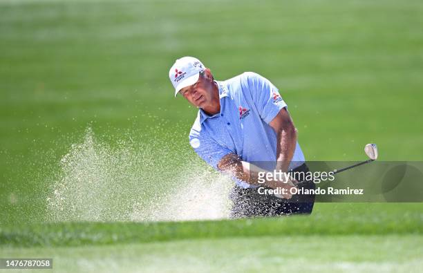 Retief Goosen of South Africa plays a shot from a bunker on the ninth hole during the third round of the Galleri Classic at The Westin Mission Hills...