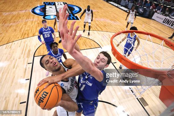 Jaedon LeDee of the San Diego State Aztecs shoots the ball against Ryan Kalkbrenner of the Creighton Bluejays during the first half in the Elite...