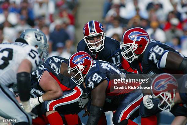 October 6: Quarterback Drew Bledsoe of the Buffalo Bills surveys the defense during the NFL game against the Oakland Raiders on October 6, 2002 at...