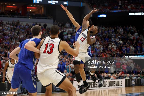 Ryan Nembhard of the Creighton Bluejays fouls Darrion Trammell of the San Diego State Aztecs during the second half in the Elite Eight round of the...