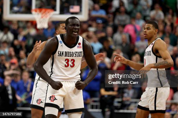 Aguek Arop of the San Diego State Aztecs celebrates against the Creighton Bluejays during the second half in the Elite Eight round of the NCAA Men's...