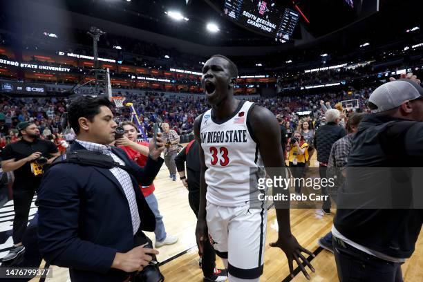 Aguek Arop of the San Diego State Aztecs celebrates after defeating the Creighton Bluejays in the Elite Eight round of the NCAA Men's Basketball...