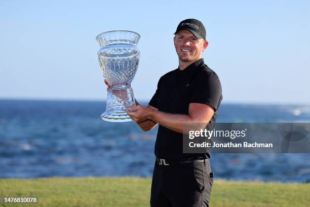 Matt Wallace of England poses with the trophy after winning the Corales Puntacana Championship at Puntacana Resort & Club, Corales Golf Course on...