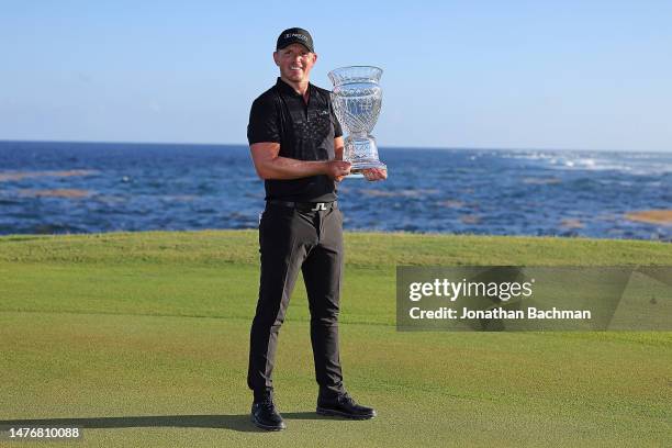 Matt Wallace of England poses with the trophy after winning the Corales Puntacana Championship at Puntacana Resort & Club, Corales Golf Course on...