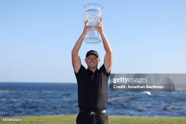 Matt Wallace of England poses with the trophy after winning the Corales Puntacana Championship at Puntacana Resort & Club, Corales Golf Course on...