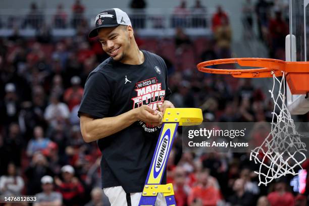 Matt Bradley of the San Diego State Aztecs celebrates by cutting down the net after defeating Creighton Bluejays in the Elite Eight round of the NCAA...