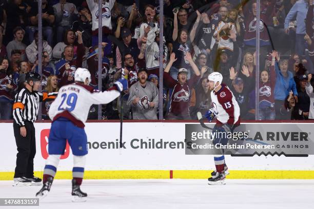 Valeri Nichushkin of the Colorado Avalanche celebrates with Nathan MacKinnon after scoring a goal against the Arizona Coyotes during the third period...