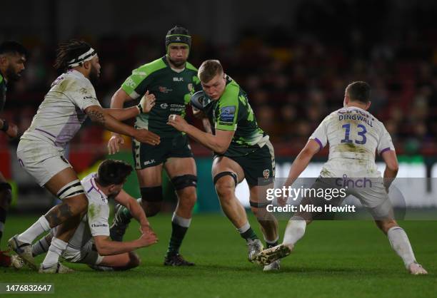 Tom Pearson of London Irish runs at the Northampton defence during the Gallagher Premiership Rugby match between London Irish and Northampton Saints...