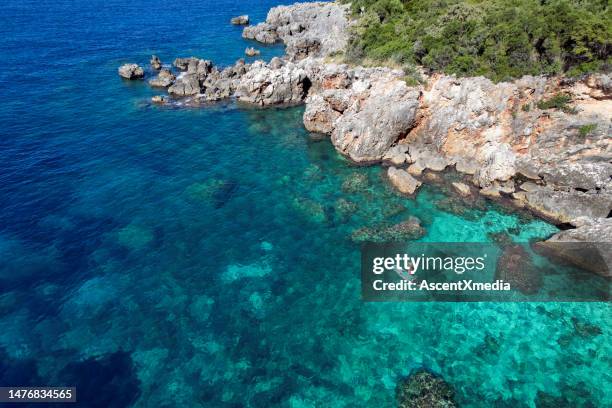 paddle boarding in the adriatic sea - albania adventure stock pictures, royalty-free photos & images