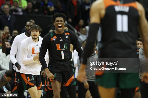 Anthony Walker of the Miami Hurricanes celebrates during the second half against the Texas Longhorns in the Elite Eight round of the NCAA Men's...