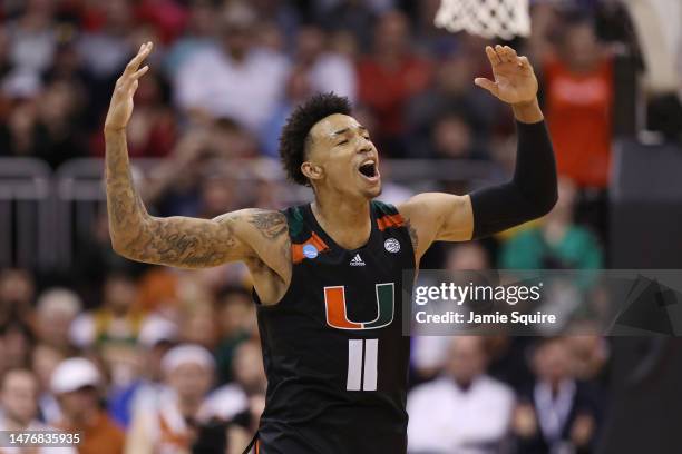 Jordan Miller of the Miami Hurricanes celebrates during the second half against the Texas Longhorns in the Elite Eight round of the NCAA Men's...