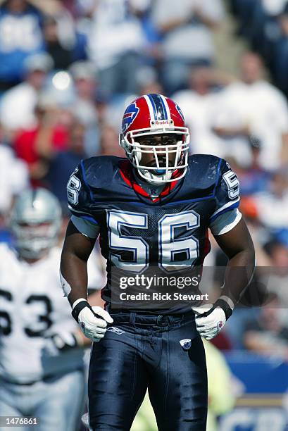 October 6: Linebacker Anthony Denman of the Buffalo Bills stands on the field during the NFL game against the Oakland Raiders on October 6, 2002 at...