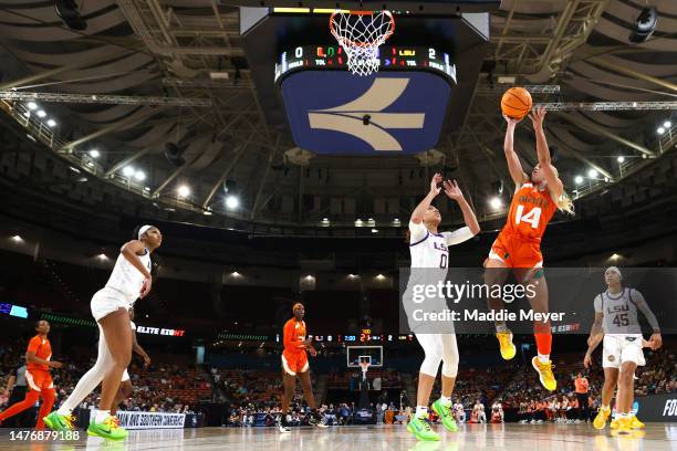 Haley Cavinder of the Miami Hurricanes shoots the ball against the LSU Lady Tigers during the first quarter in the Elite Eight round of the NCAA...