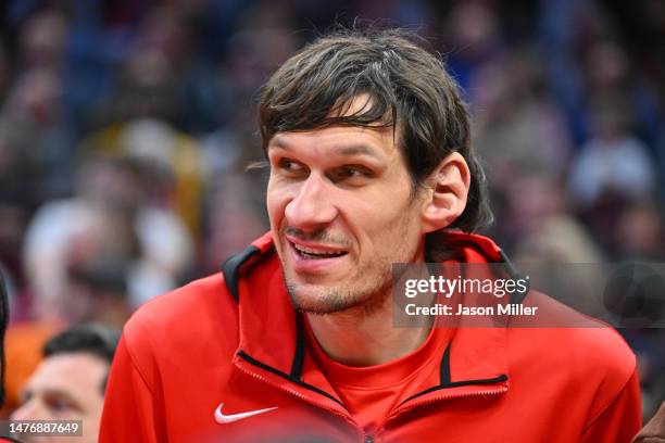 Boban Marjanovic of the Houston Rockets watches from the bench during the second half against the Cleveland Cavaliers at Rocket Mortgage Fieldhouse...