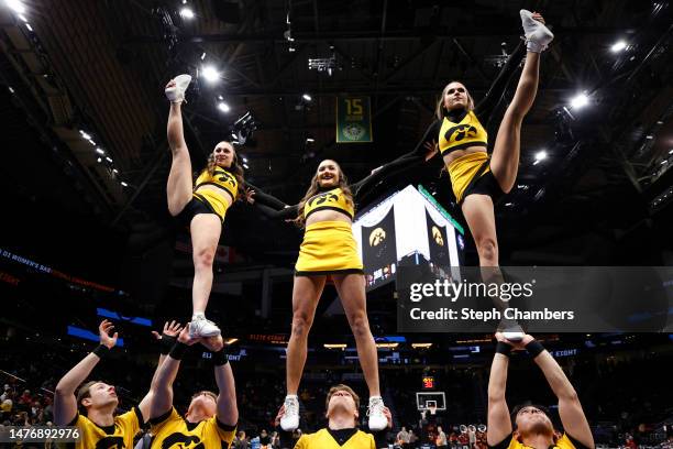 Iowa Hawkeyes cheerleaders perform prior to a game against the Louisville Cardinals in the Elite Eight round of the NCAA Women's Basketball...