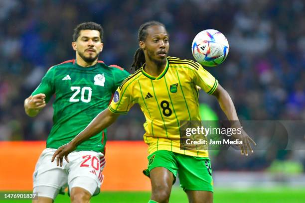 Henry Martin of Mexico fights for the ball with Daniel Johnson of Jamaica during the match between Mexico and Jamaica as part of the CONCACAF Nations...