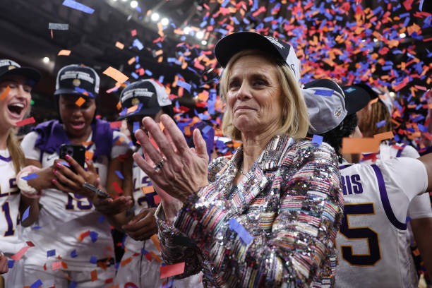 Head coach Kim Mulkey of the LSU Lady Tigers celebrates after defeating the Miami Hurricanes 54-42 in the Elite Eight round of the NCAA Women's...