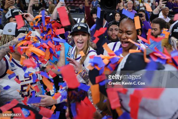 The LSU Lady Tigers celebrates after defeating the Miami Hurricanes 54-42 in the Elite Eight round of the NCAA Women's Basketball Tournament at Bon...