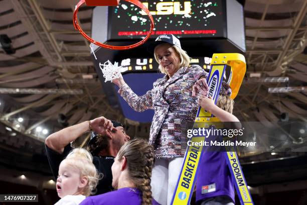 Head coach Kim Mulkey of the LSU Lady Tigers celebrates after defeating the Miami Hurricanes 54-42 in the Elite Eight round of the NCAA Women's...