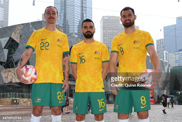 Jackson Irvine, Aziz Behich and Bailey Wright of the Socceroos pose during an Australia Socceroos Media Opportunity at Federation Square on March 27,...