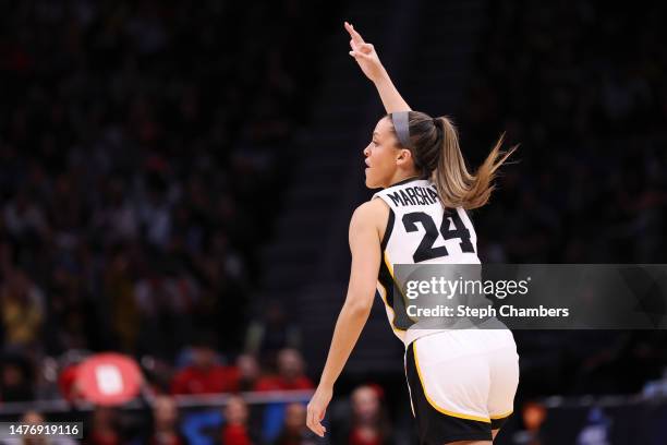 Gabbie Marshall of the Iowa Hawkeyes celebrates during the third quarter of the game against the Louisville Cardinals in the Elite Eight round of the...