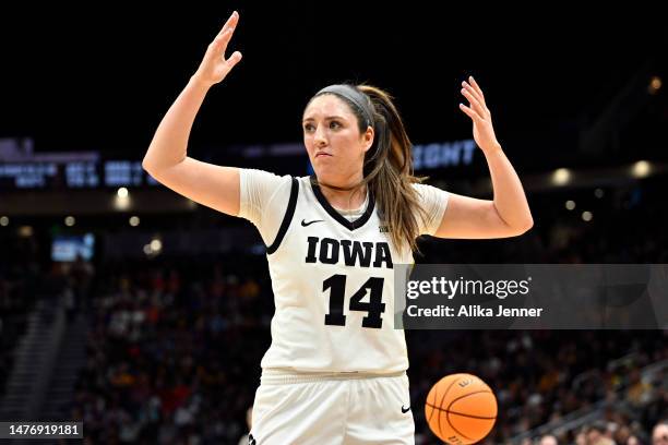 McKenna Warnock of the Iowa Hawkeyes reacts during the third quarter of the game against the Louisville Cardinals in the Elite Eight round of the...