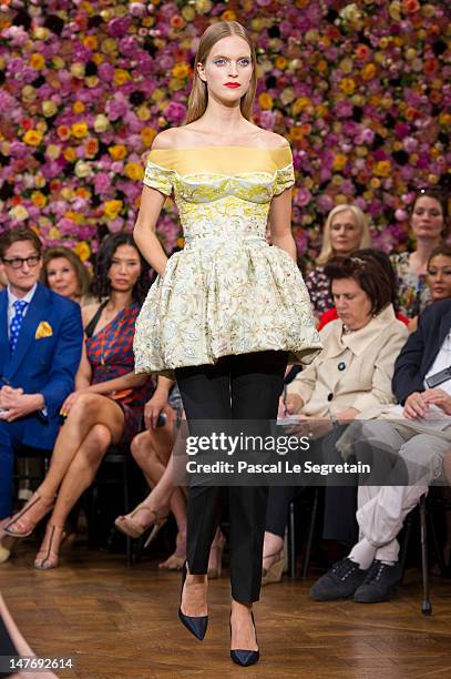 Model walks the runway during the Christian Dior Haute-Couture show as part of Paris Fashion Week Fall / Winter 2013 on July 2, 2012 in Paris, France.