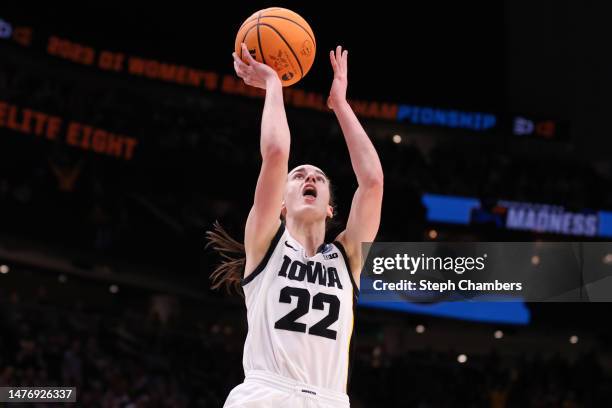 Caitlin Clark of the Iowa Hawkeyes shoots the ball during the third quarter against the Louisville Cardinals in the Elite Eight round of the NCAA...