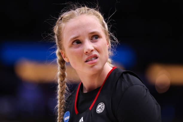 Hailey Van Lith of the Louisville Cardinals reacts during the fourth quarter against the Iowa Hawkeyes in the Elite Eight round of the NCAA Women's...