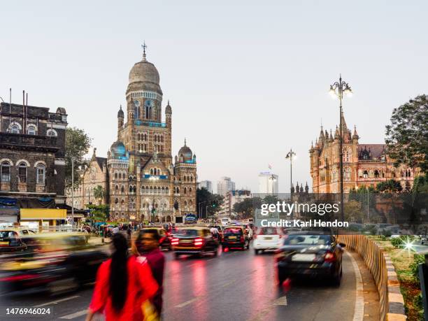 dusk on the streets of mumbai - mumbai street stock pictures, royalty-free photos & images