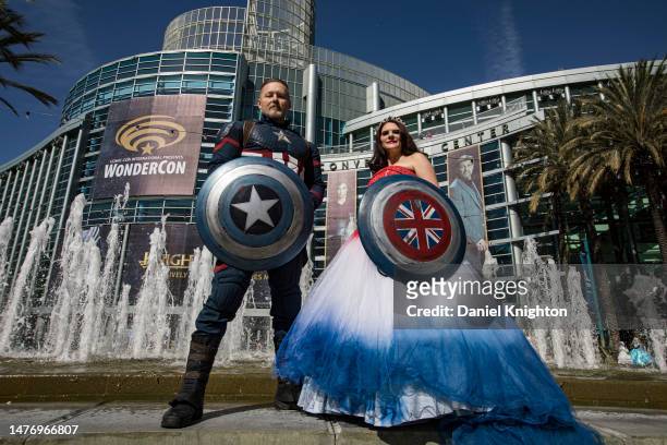 Marvel cosplayers Shawn Richter as Captain America and Lisa Lower as Princess Peggy pose at Day 3 of WonderCon 2023 at Anaheim Convention Center on...