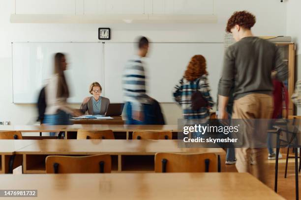 leaving the classroom in blurred motion! - motion study stock pictures, royalty-free photos & images