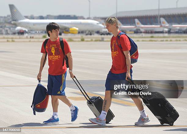 Spain's David Silva and Fernando Torres arrive at Barajas airport with the rest of the team on July 2, 2012 in Madrid, Spain. Spain beat Italy 4-0 in...