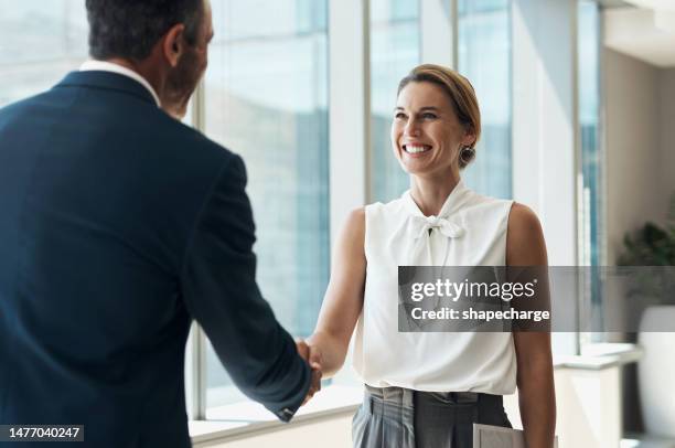 handshake, meeting and business people partnership for b2b collaboration, onboarding welcome or professional opportunity. corporate woman or clients shake hands for deal in office building interview - thank you for your hard work stock pictures, royalty-free photos & images