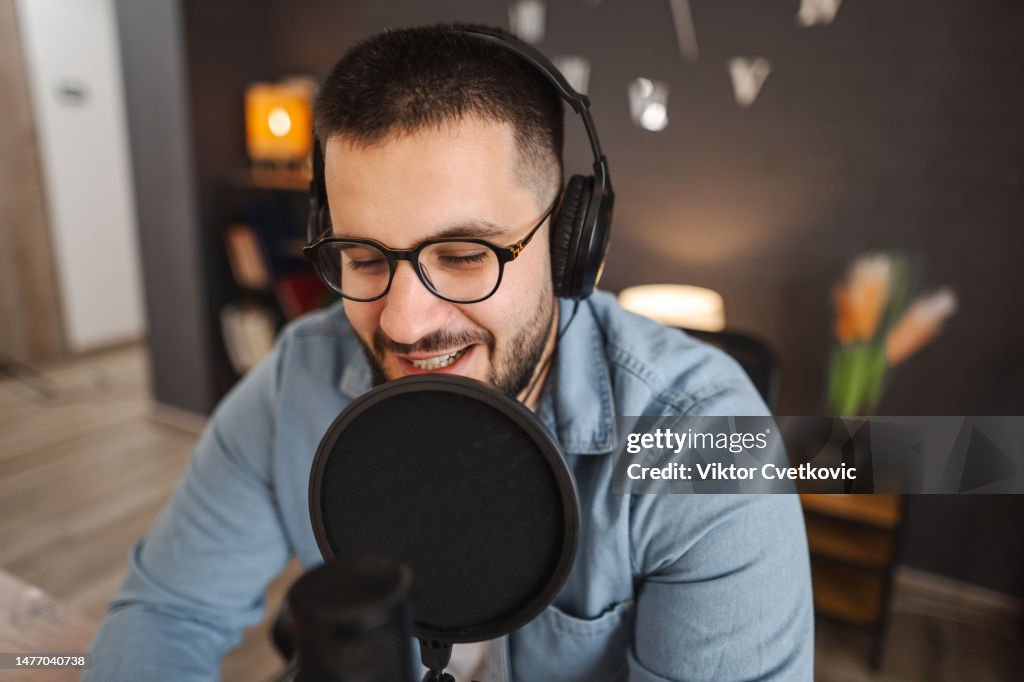 Young men recording a podcast