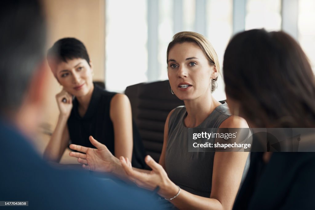 Business woman, mentor meeting and leader of corporate conversation, collaboration and feedback. Female manager, team discussion and company seminar in workshop, executive planning and group strategy