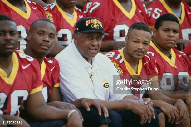 Eddie Robinson , Head Coach of the Grambling State University Tigers football team talks with his players during Media Day on 13th August 1997 at the...