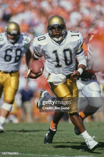 Shawn Jones, Quarterback for the Georgia Tech Yellow Jackets in motion running the football during the NCAA Atlantic Coast Conference college...