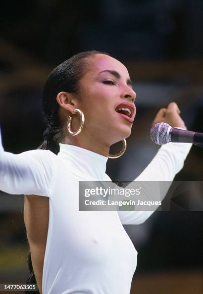Sharde Singer Sade sings during the Live Aid concert held in London. The 1985... News ...