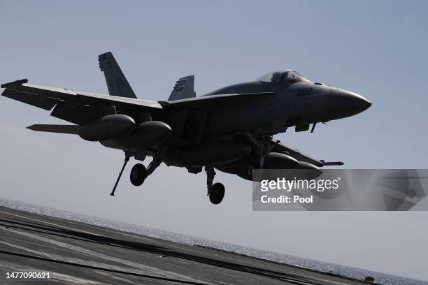 Super Hornet lands on the flight deck of the USS Nimitz during an South Korea and US combined maritime exercise as a part of Warrior Shield at sea on...
