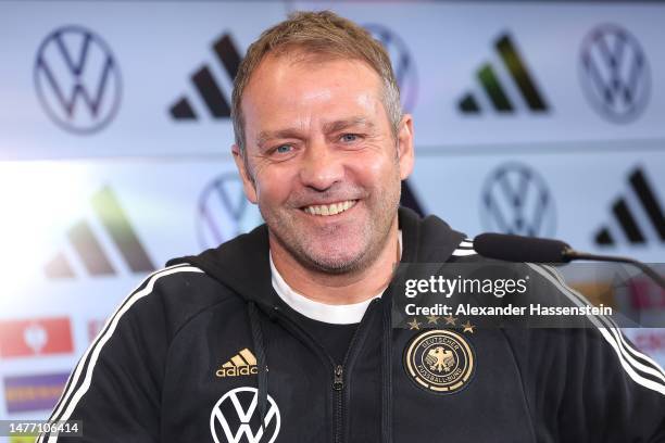 Hans-Dieter Flick, head coach of Germany smiles during a team Germany press conference at DFB-Campus on March 27, 2023 in Frankfurt am Main, Germany.